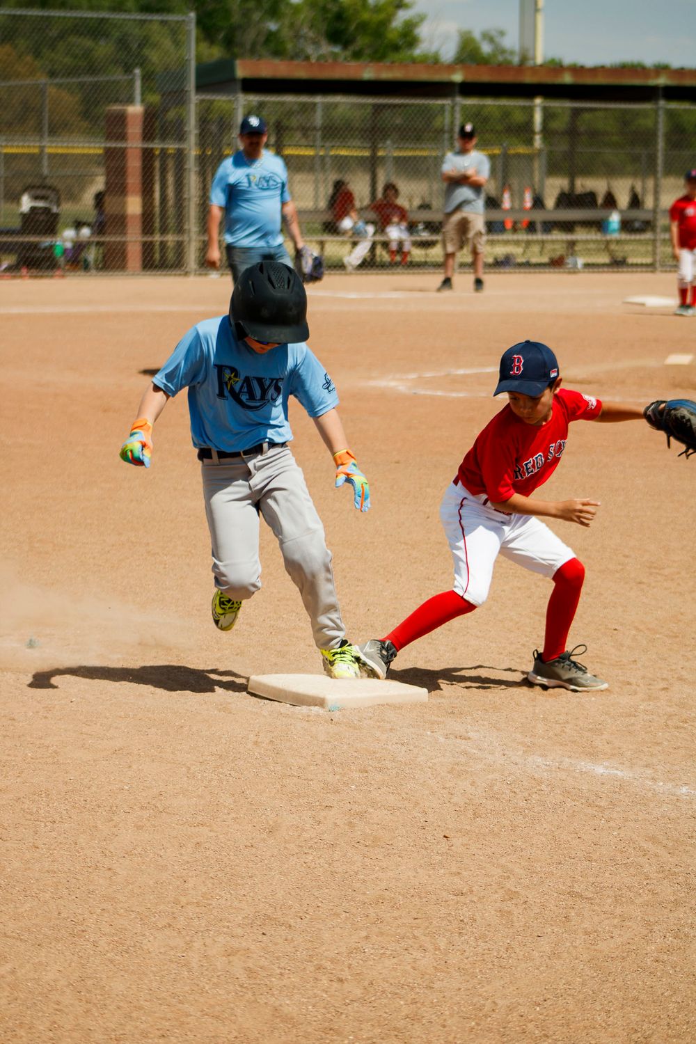 Young boys playing Little League Baseball during a sports photography session in Amarillo, Texas