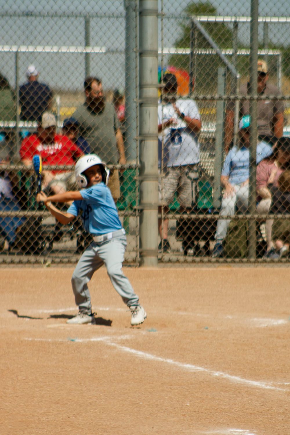Young boys playing Little League Baseball during a sports photography session in Amarillo, Texas