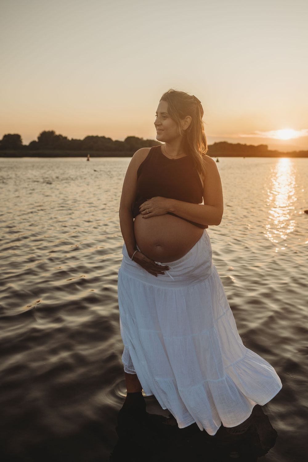Maternity photoshoot at the beach in Dorset during sunset