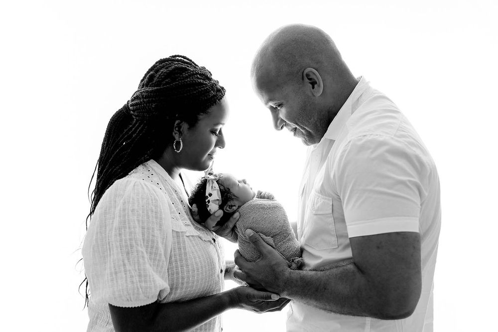 Black and white photo of parents by Perris newborn photographer.