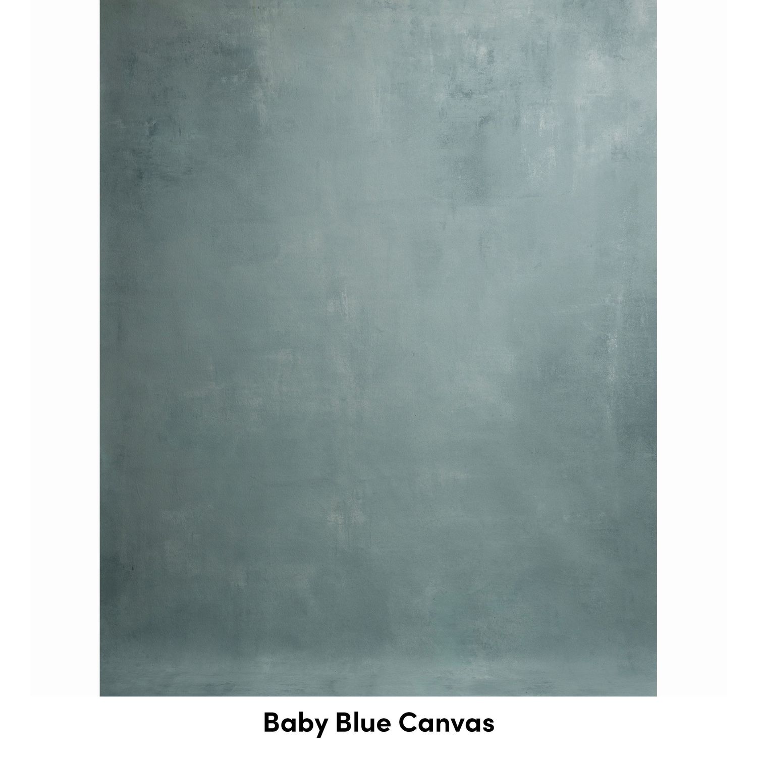Abstract baby blue canvas texture with cloudy gray tones and mottled surface creates a soft dreamy background.