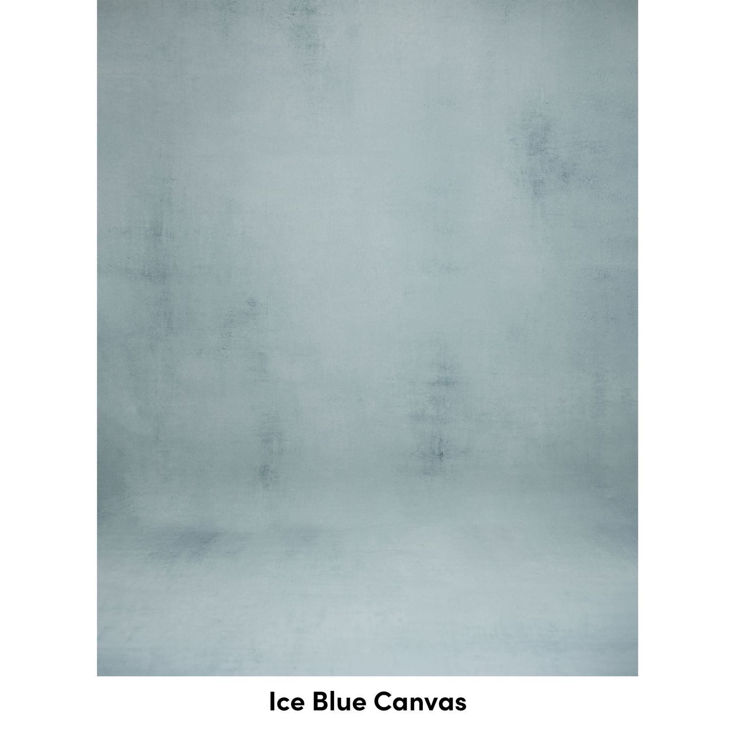 A soft gradient backdrop in ice blue color with a faded gray textured effect for studio photography.