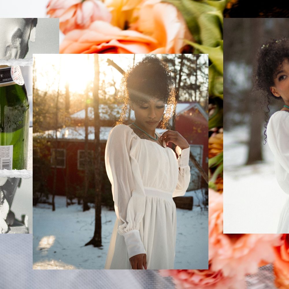 Winter wedding scene with flowing white dress against snowy landscape and orange sunset.