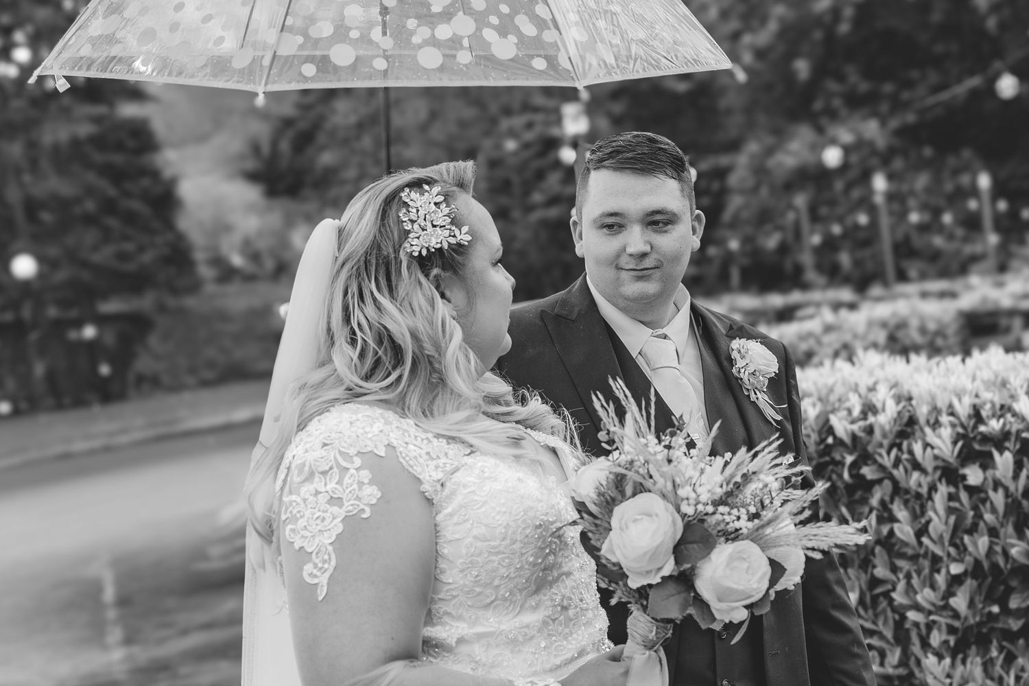 Relaxed couple photos on a rainy wedding day.