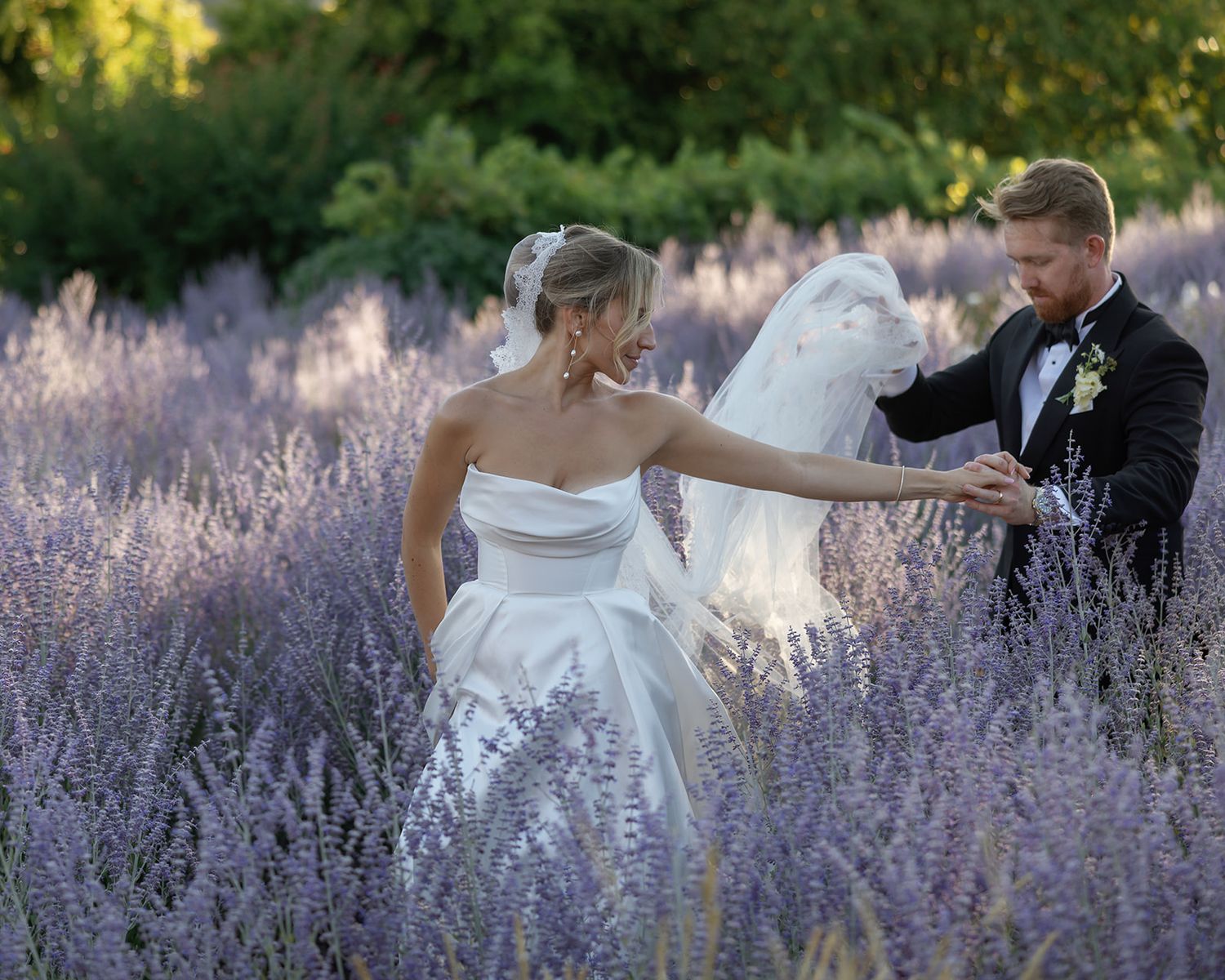 Couple walking in lavender garden at the stunning Bernardus Lodge in Carmel Valley.