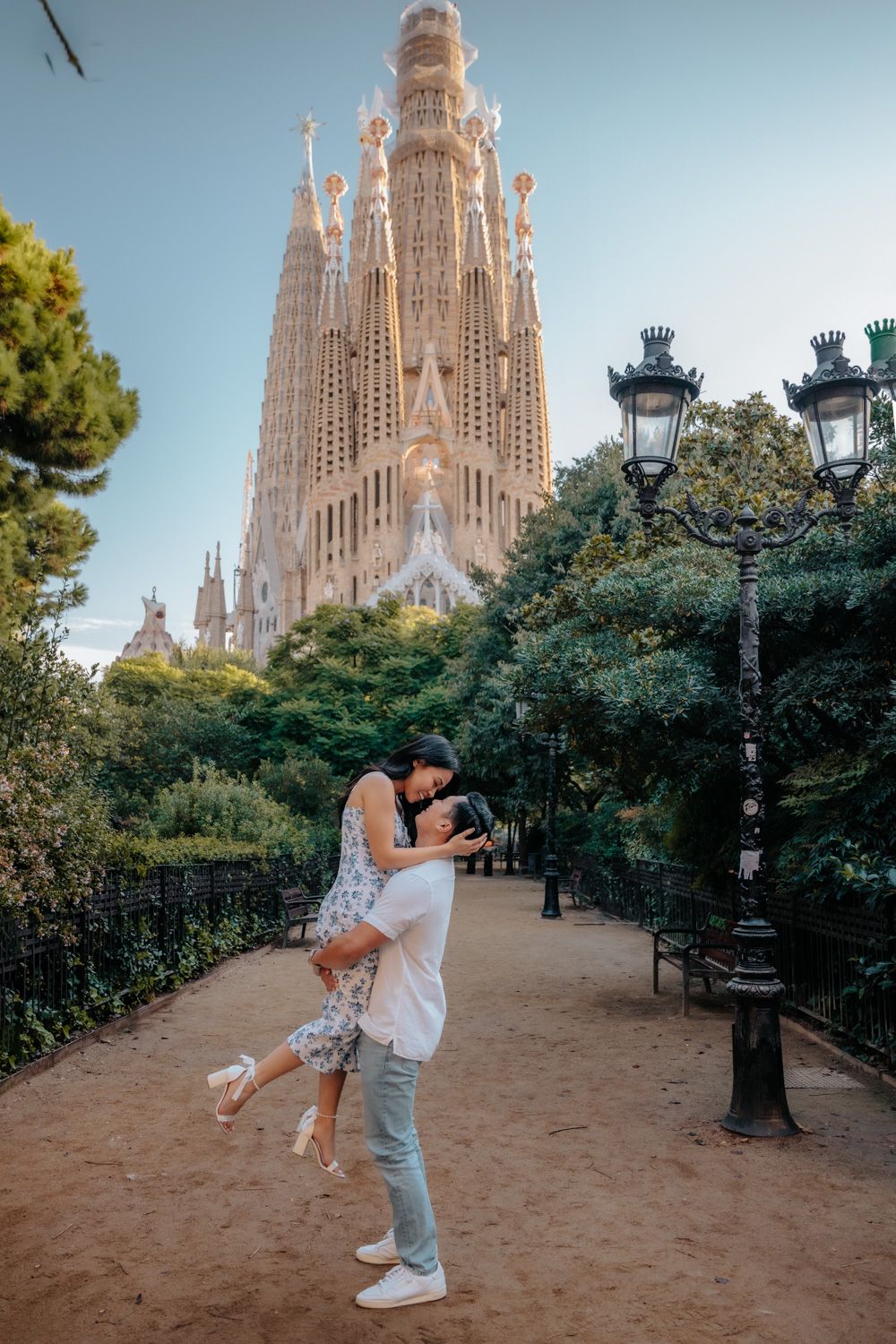 Sweet embrace between future bride and groom in Spain.