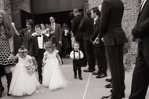 Candid photo of a little boy at a St. Louis wedding.