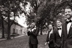 Groomsman candid photo at a St. Louis wedding.