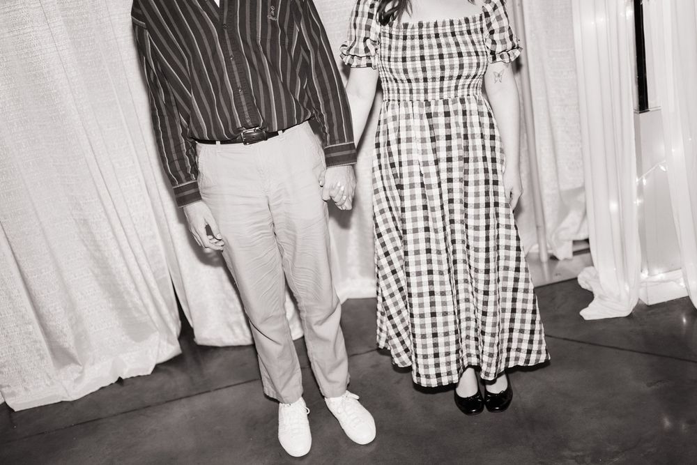 A couple's mid century modern outfit at a St. Louis wedding.