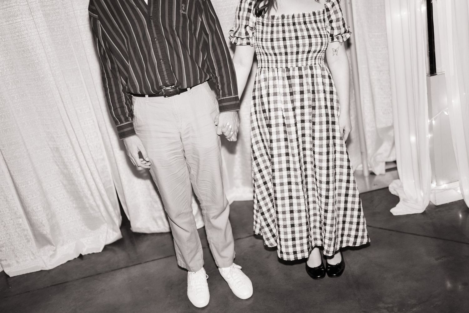 A couple's mid century modern outfit at a St. Louis wedding.