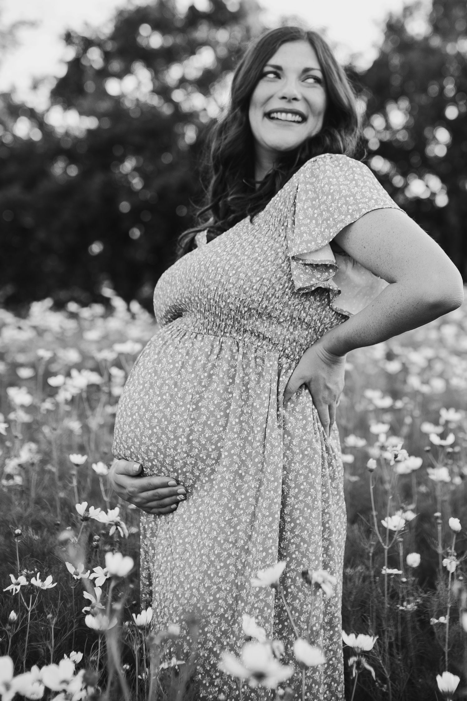 Flower field maternity session in Wichita Kansas by Jessica Nadine Photography