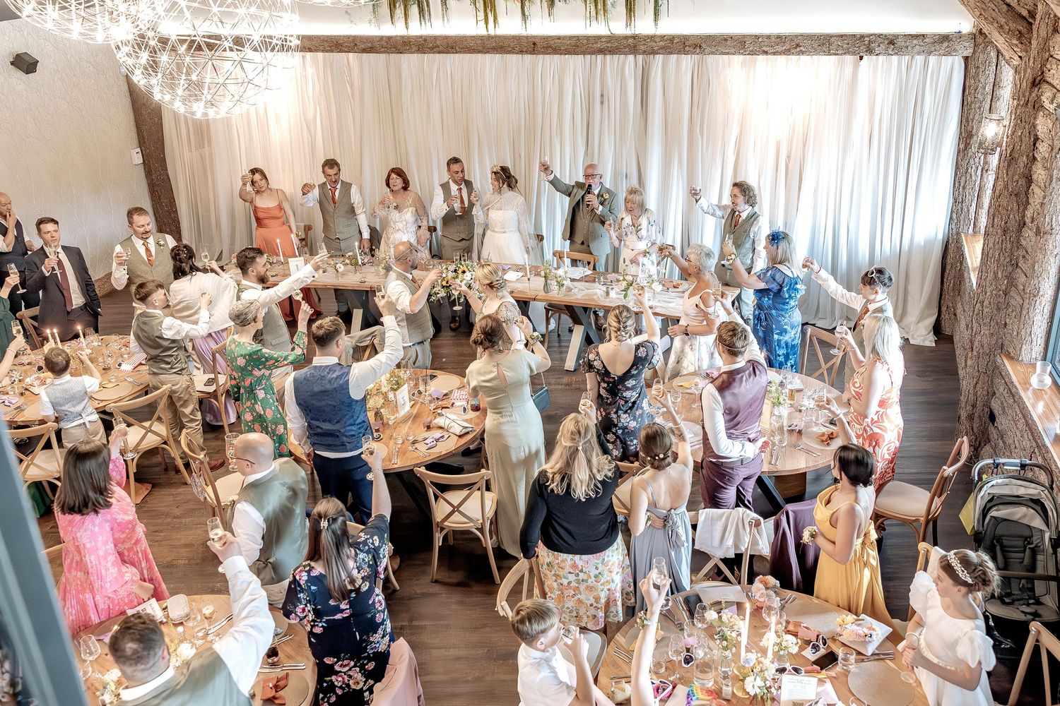 Candid wedding moments and guest reactions during speeches.