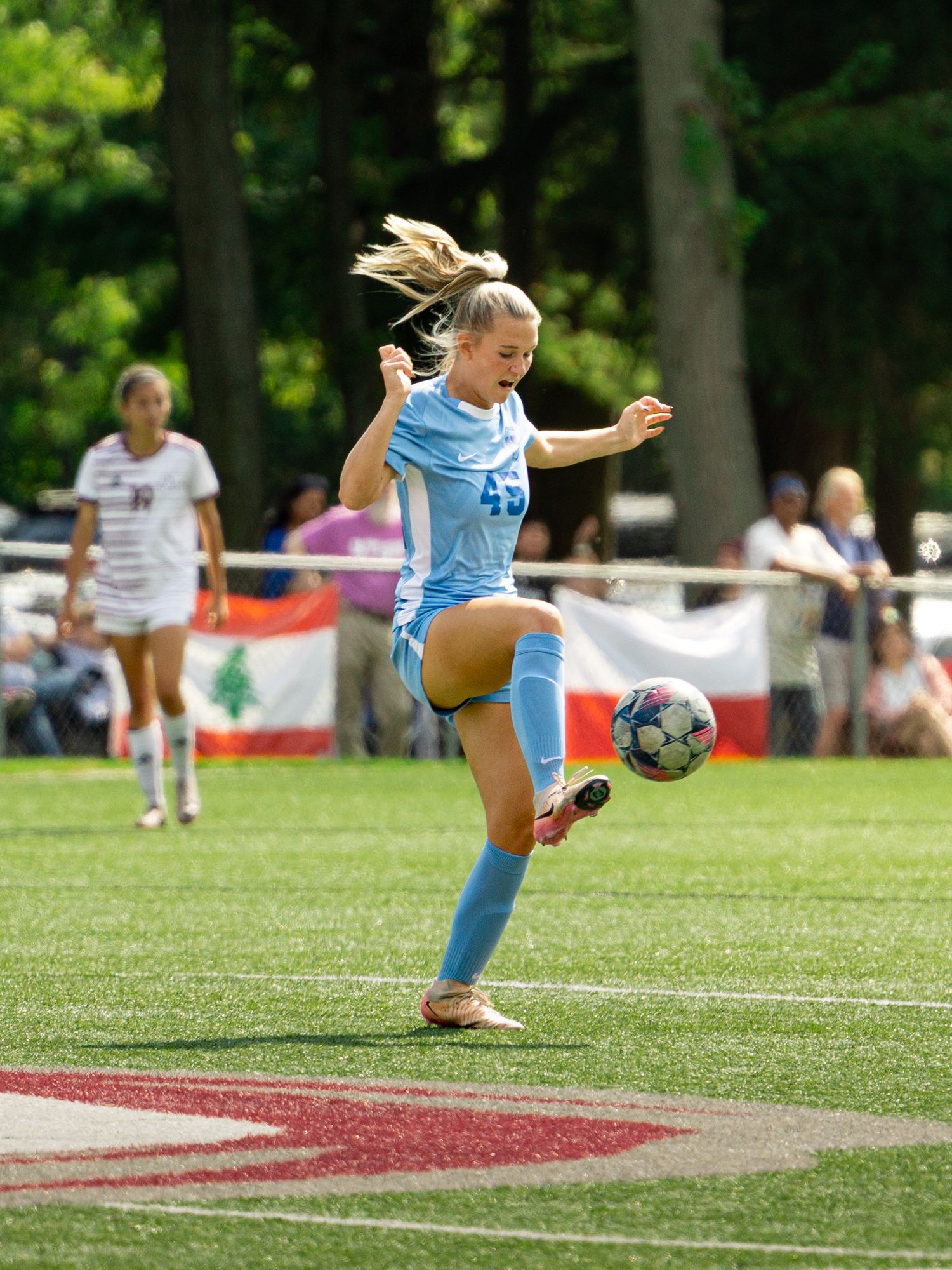 Rylie Cassette taking control of a pass, Madonna vs Aquinas, Aquinas College Athletic Field, Grand Rapids MI, 9/20/25