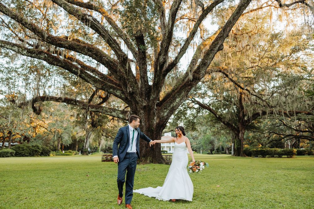 Wedding scenes captured under majestic oak trees draped with Spanish moss during a romantic outdoor celebration.