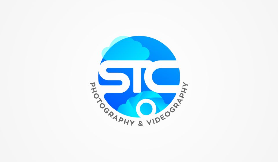 A circular logo design featuring 'STC' text with photography and videography text around a blue cloud background pattern.