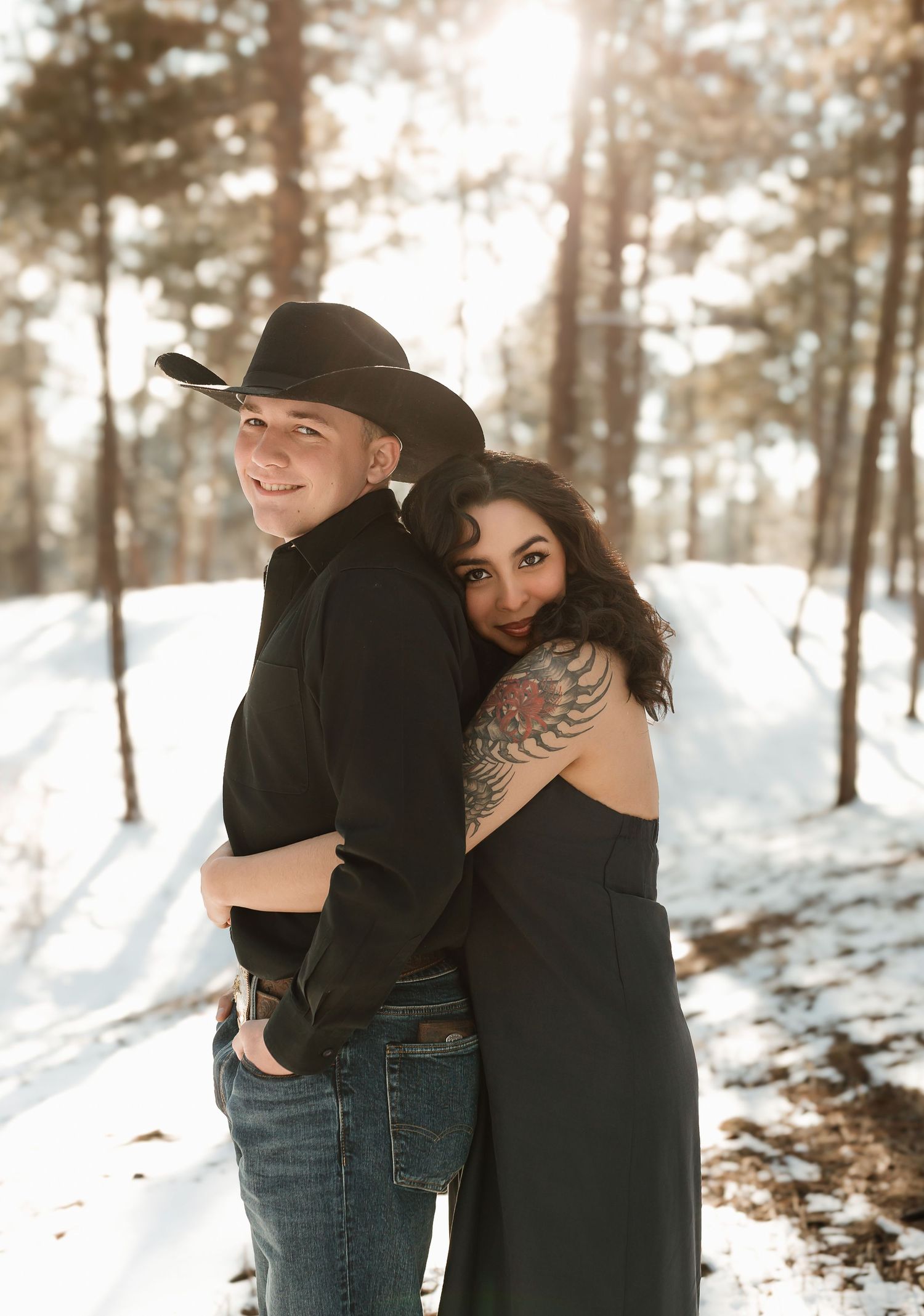 A series of intimate images showing an affectionate couple embracing outdoors against a desert landscape at sunset.