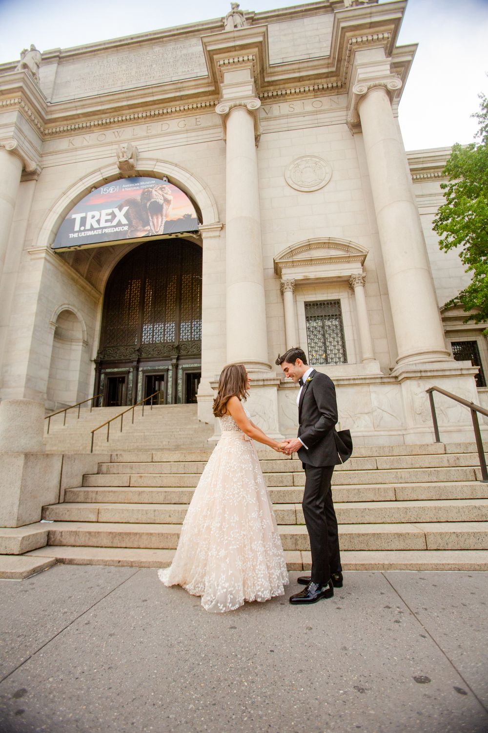 Wedding couple enjoying first look in front of Museum of Natural history in NYC
