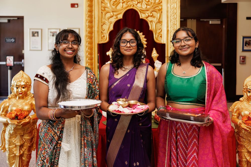 Colorfully dressed attendees gather at a cultural celebration event.