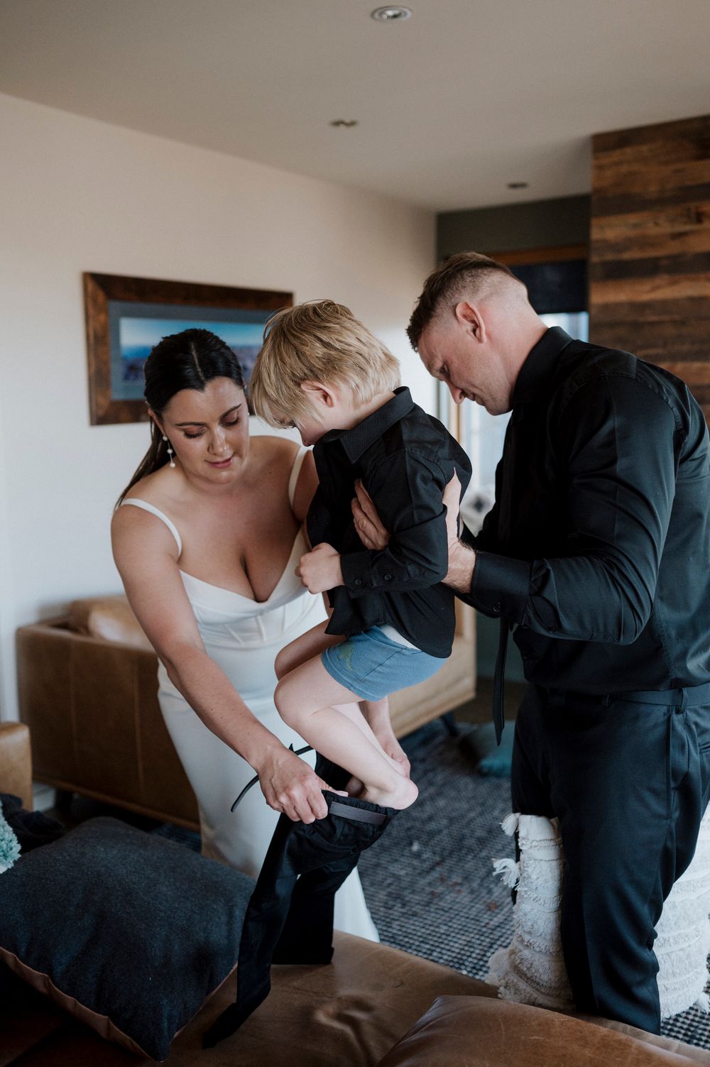 A sequence of wedding preparation moments captured as the couple helps each other get ready for their special day.