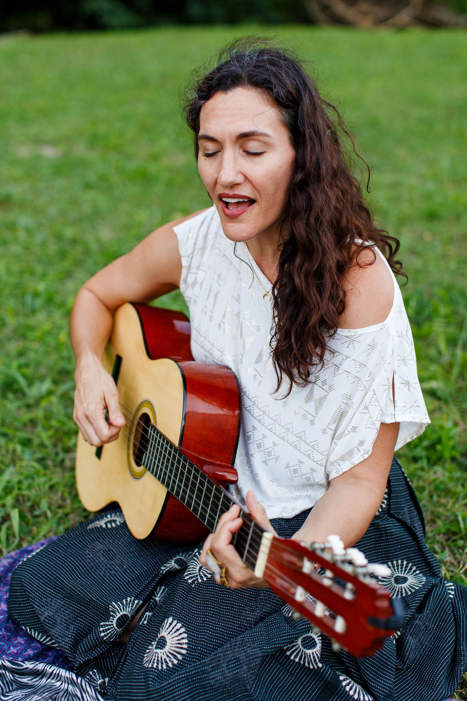 Portrait of a woman with a guitar in San Juan, Puerto Rico.