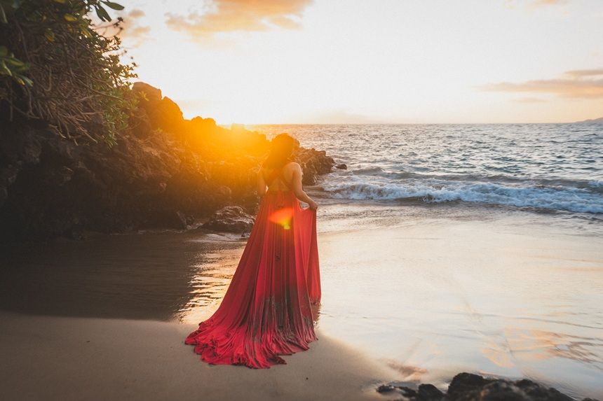 Maui flying dress photographer photo against beautiful Maui sunset beach by ohwowfotos.