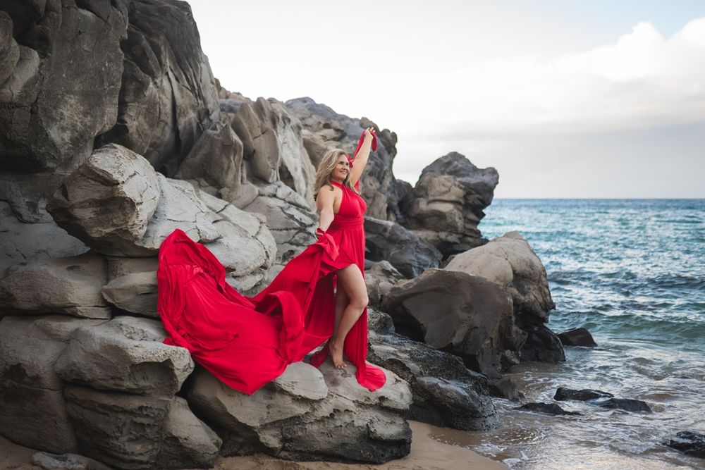 Maui flying dress photographer photo against beautiful Maui sunset beach by ohwowfotos.