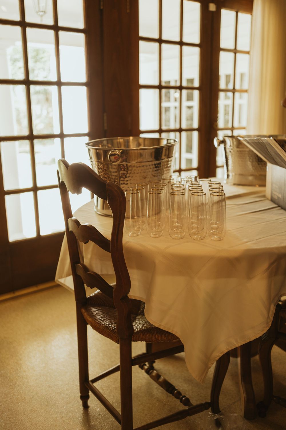 Rustic wooden tables with eucalyptus centerpieces at Lafayette wedding