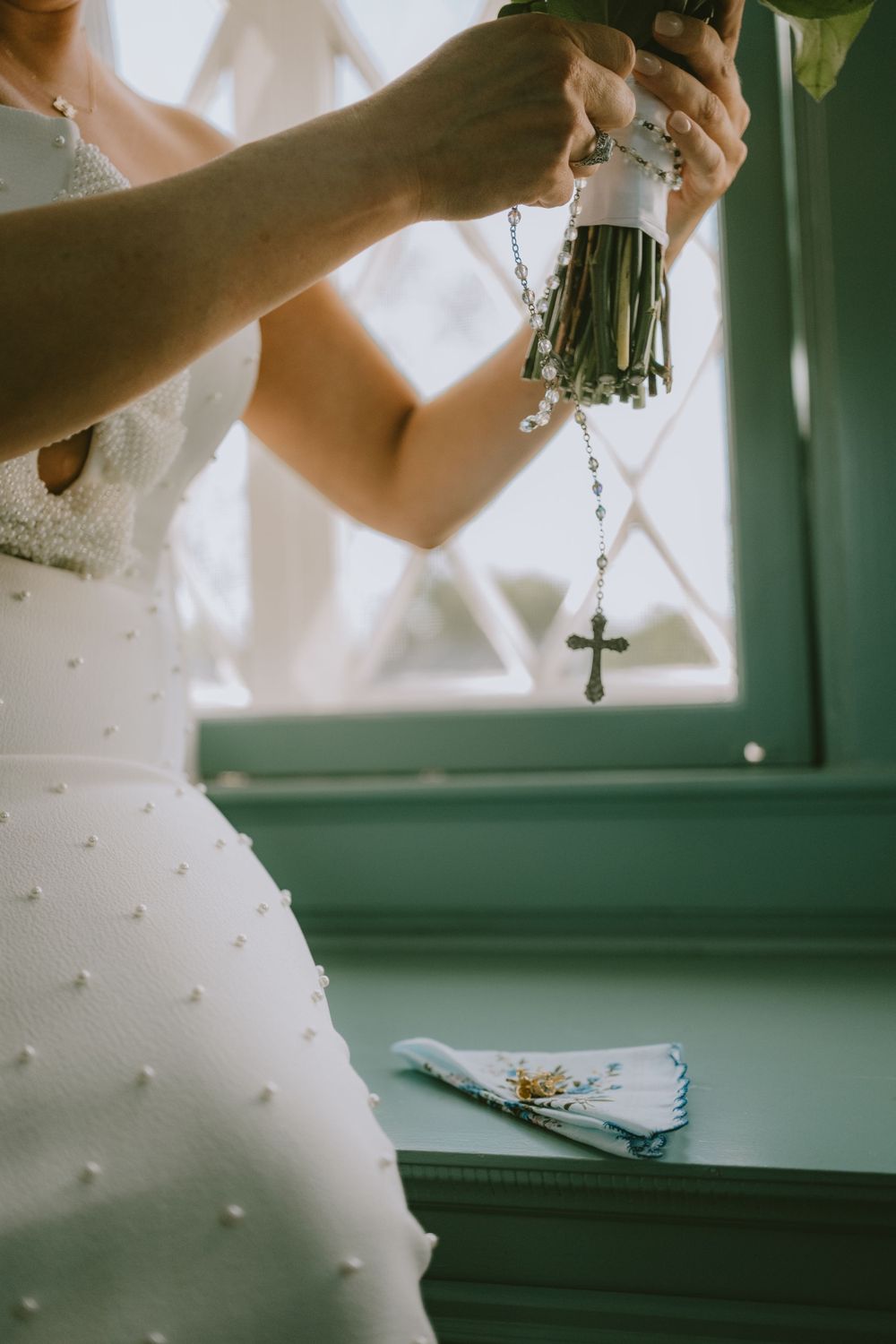 Bride with bouquet and rosary Lafayette event space