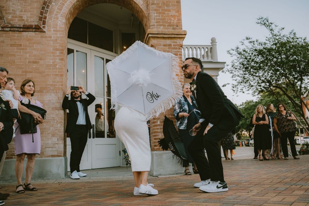 Bridal party cheering and dancing at Lafayette wedding reception