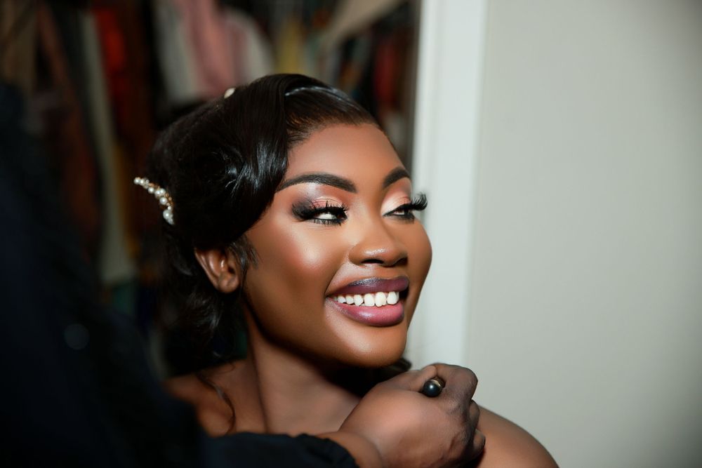 Glamorous professional photoshoot featuring elegant evening makeup and jewelry.