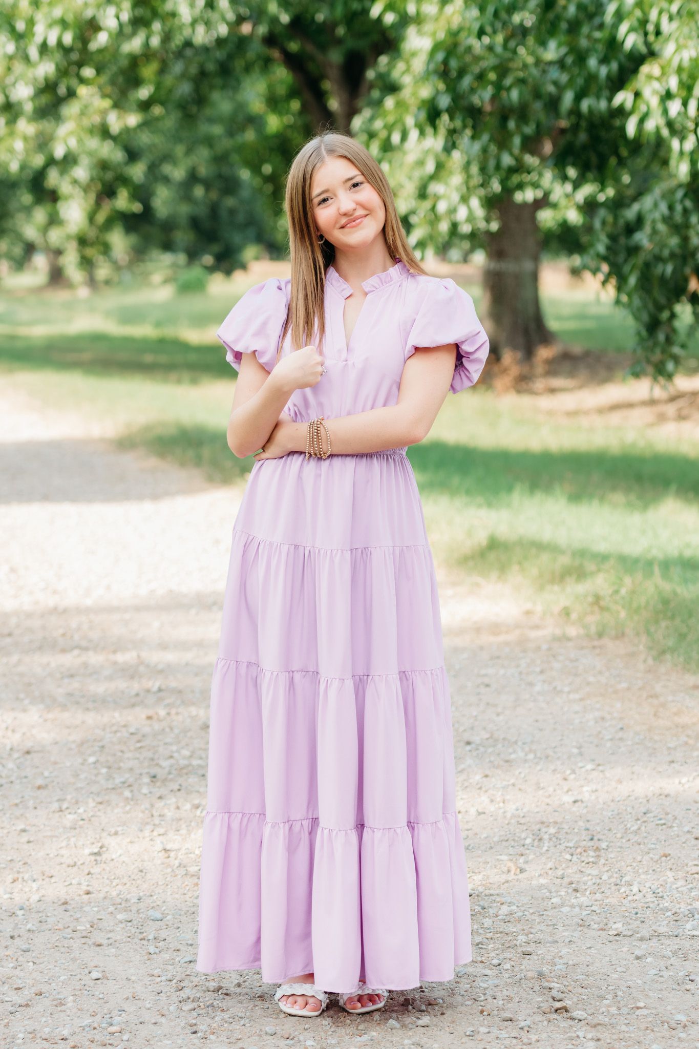 Tallulah Louisiana outdoor female senior session with a purple dress