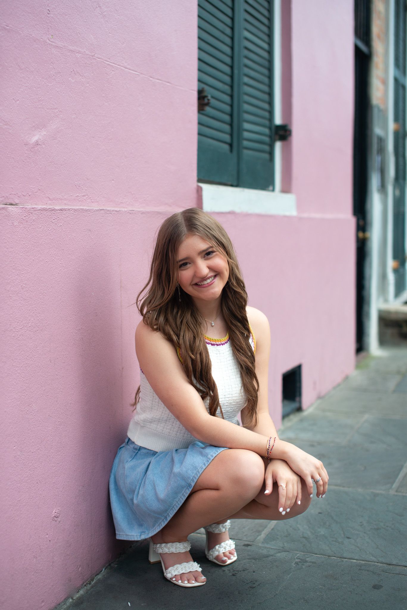 Tallulah Academy senior session taken in New Orleans during rainy day weather.