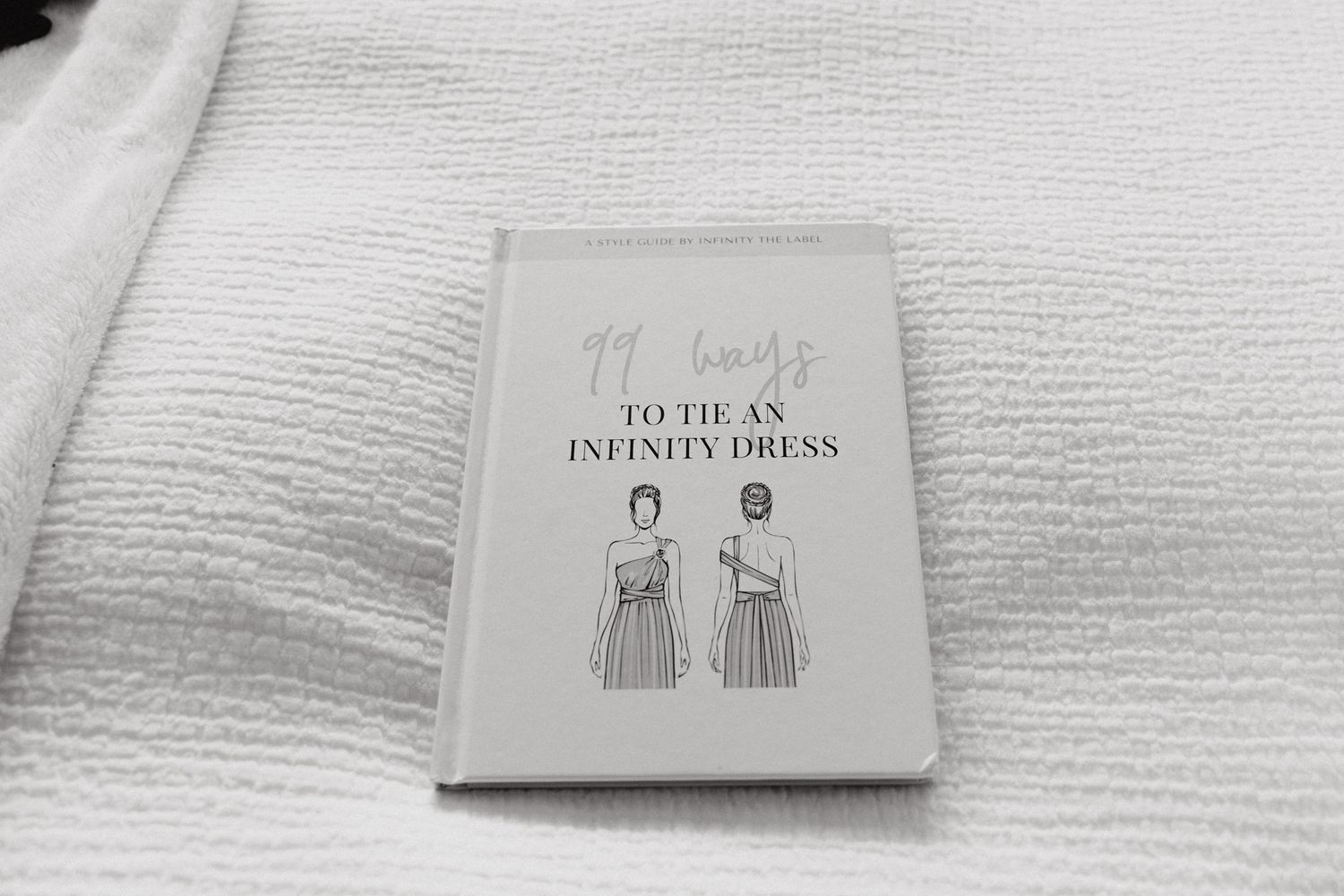 Black and white book cover, captured by Apertured Media Auckland Wedding Photographer.