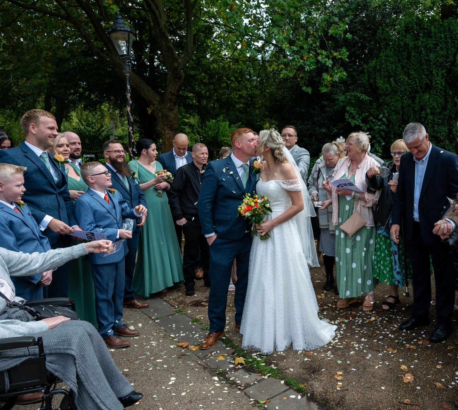 Weekday wedding ceremony at The Belmont Hotel, Leicester with confetti thrown on New Walk