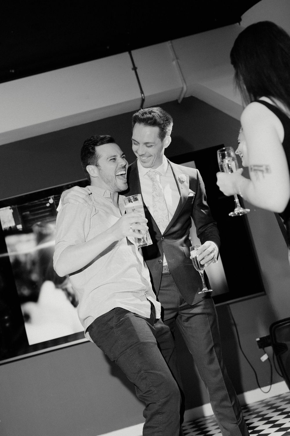 Groom and the guests having fun at the wedding reception in Manchester