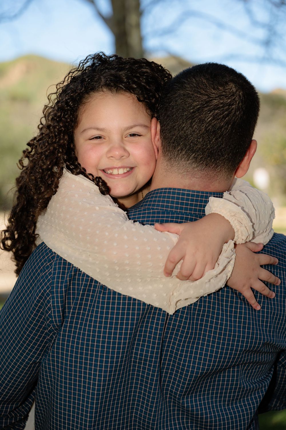 Family photoshoot shot at local park in Los Angeles County. Park name is O'melvany Park.