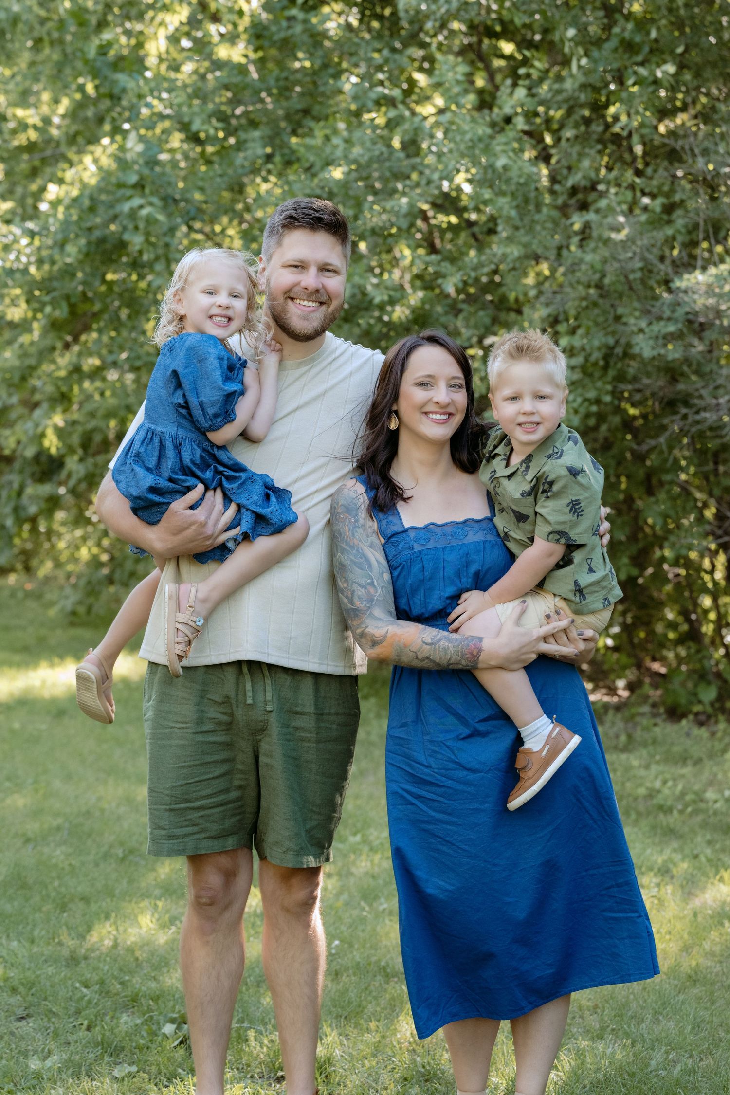 another single family unit portrait during multi generational family session at powers lake park in woodbury mn
