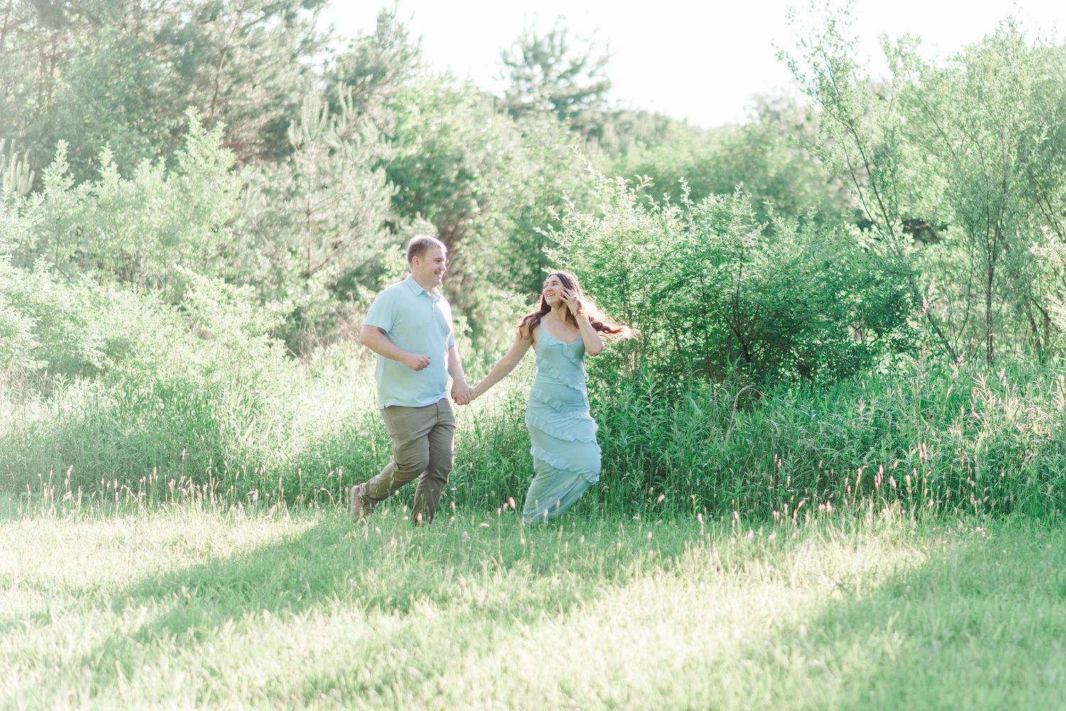 Engagement session at Quemahoning Reservoir in Johnstown Pennsylvania, running together