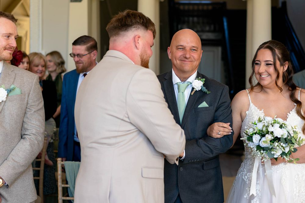 Bride and father walking down isle at the stunning Crowcombe Court Somerset Wedding venue