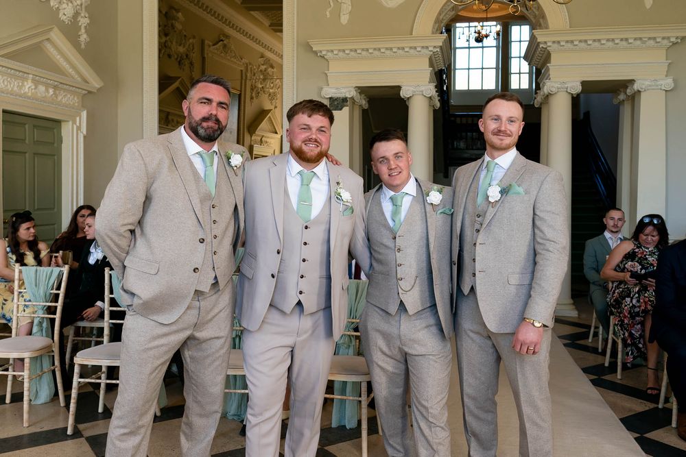 Groom and groomsmen in ceremony at a Crowcombe Court  Wedding