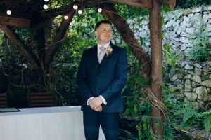 Groom celebrating with friends at a Cornwall wedding.
