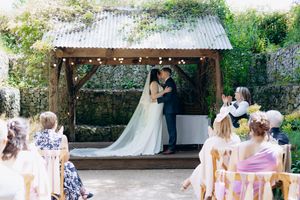 Wedding guests enjoying sunshine at The Stack House.