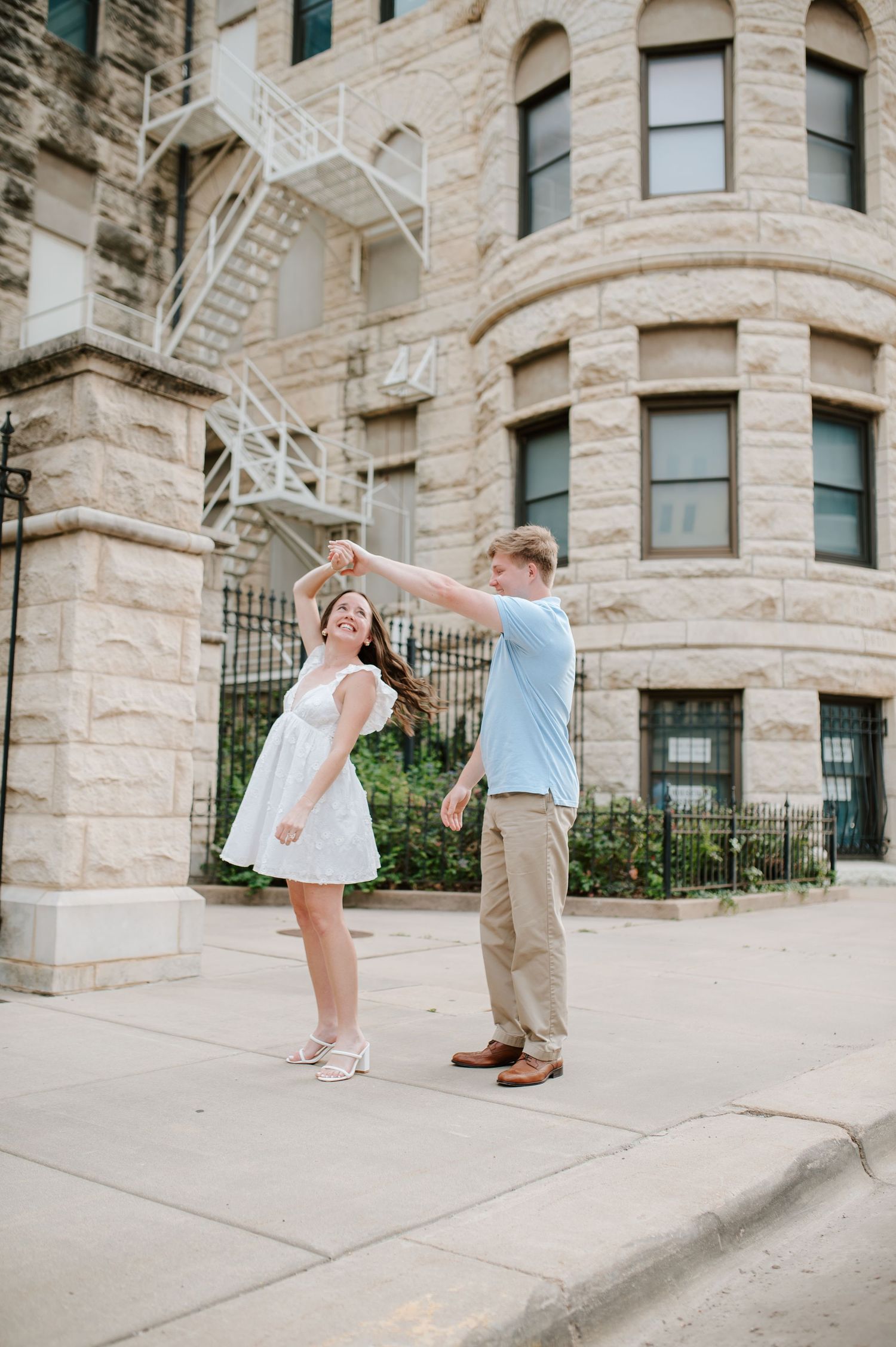 Downtown Wichita, KS engagement session by photographer Jessica Nadine Photography. Courthouse building sedgwick county historical museum