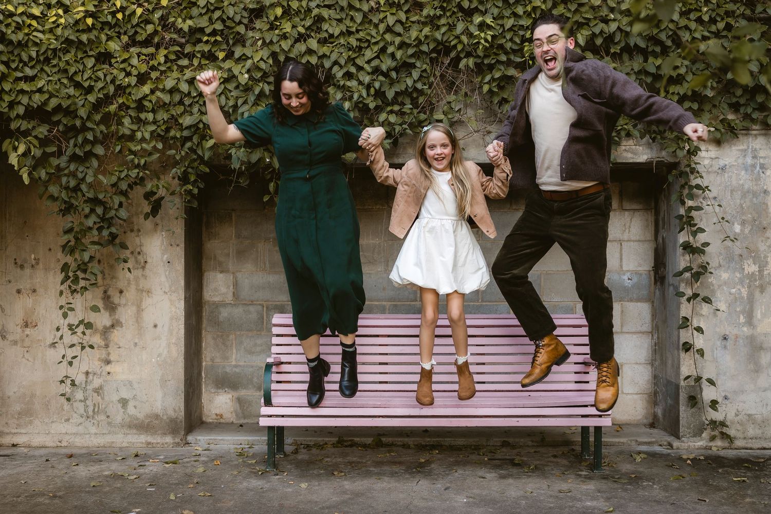 Dad and adult son laughing during Brisbane family photo shoot