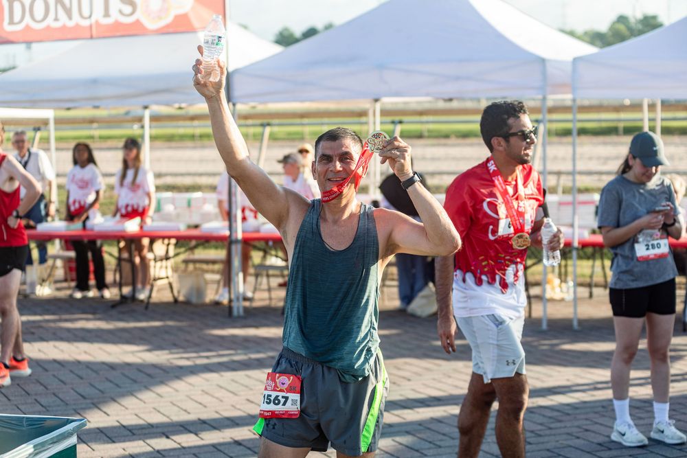runners competing at the Shipley Do-Nut Dash 5K Houston community event