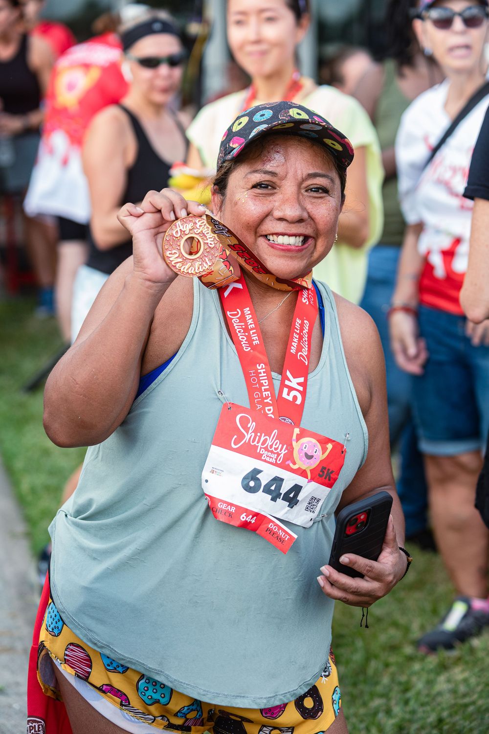 unners wearing medals at the Shipley Donut Dash 5K in Houston TX