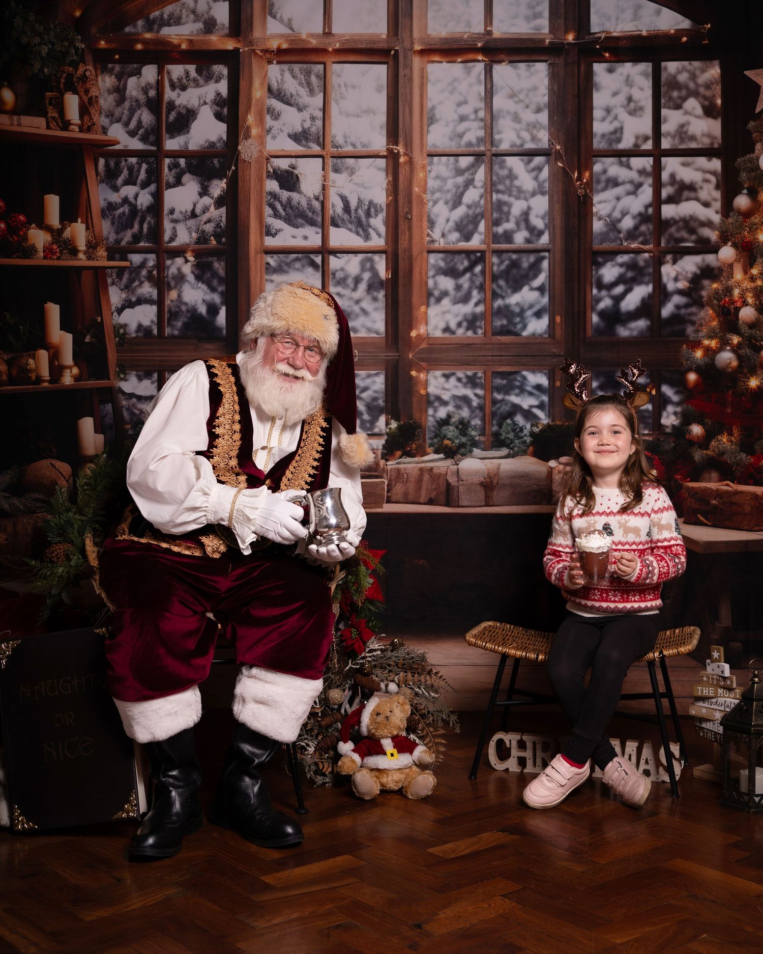 Festive holiday scene with traditional decorations and furnishings in a cozy winter cabin setting.