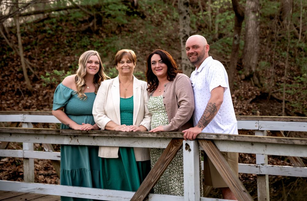 Family of four enjoying an outdoor photography session at Tawawa Park in Sidney, Ohio