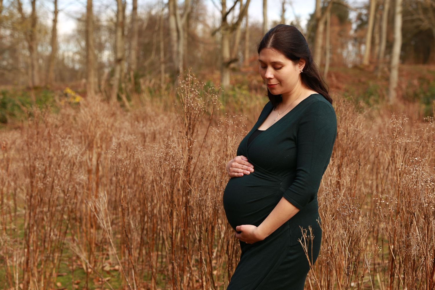 A serene and beautiful outdoor maternity session with a glowing pregnant mum, capturing the anticipation and joy of motherhood