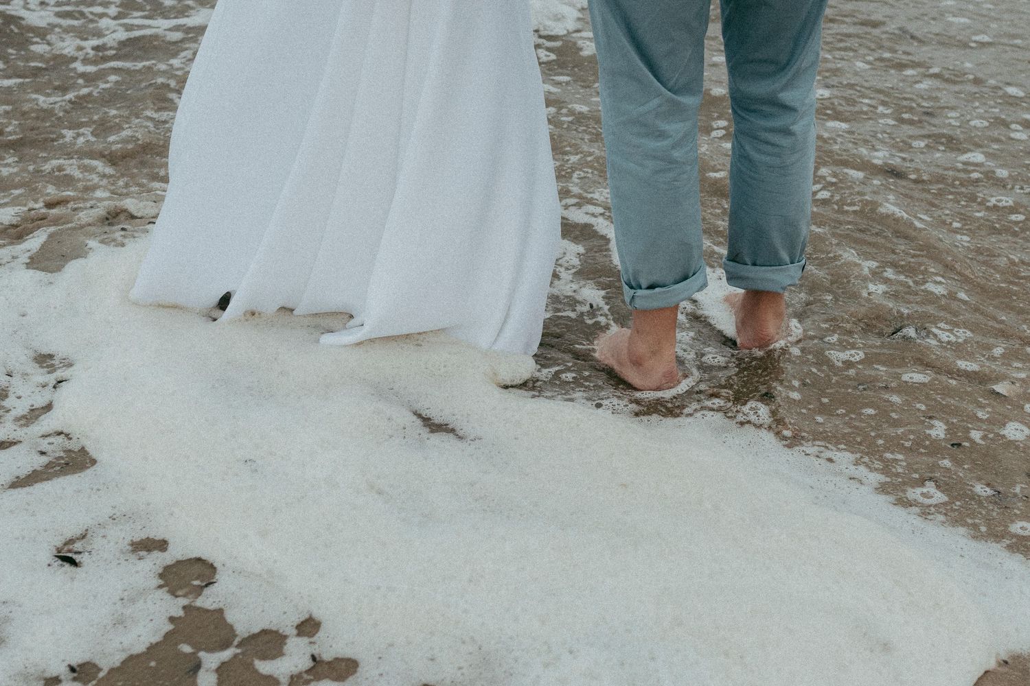 A couple visiting Swakopmund and decided on a photoshoot at the beach